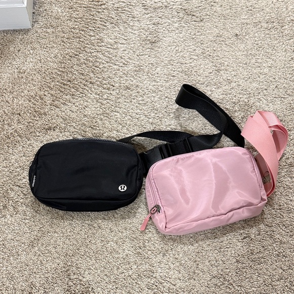 lululemon athletica Handbags - lululemon athletica Black and Pink Crossbody Bags